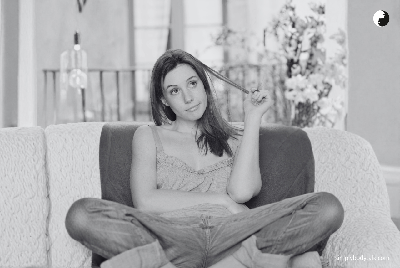 female bored playing with hair The way your hair signals